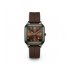 Watch with brown strap and face on a white background