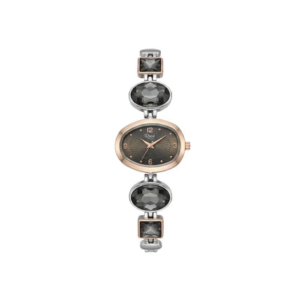 Watch with gemstone accents on a white background