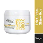 White jar of Xtenso Care hair mask with gold label on a white background