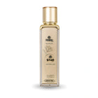 Perfume bottle with gold cap and beige body on a white background
