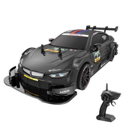 Black RC car with detailed design and remote control on a white background