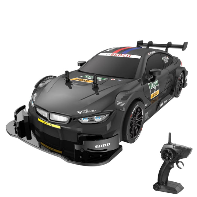 Black RC car with detailed design and remote control on a white background