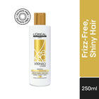 L'Oreal Xtenso Care shampoo bottle with packaging on a white background