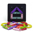 Colorful magnetic building toy set on a white background