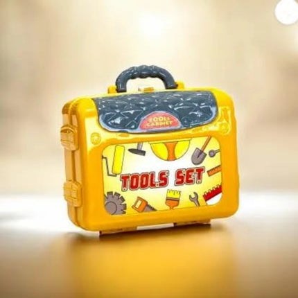 Toy tool set in a yellow case with tool graphics on a beige background