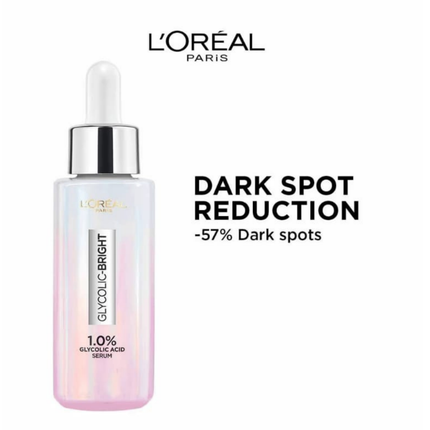 L'Oreal Paris serum bottle with dark spot reduction text on a white background