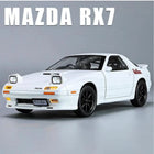 White Mazda RX7 car on a gray background with 'MAZDA RX7' text above.