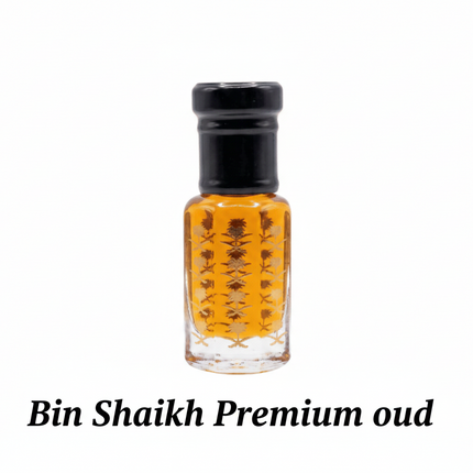 Small glass bottle with black lid containing a yellowish liquid on a white background