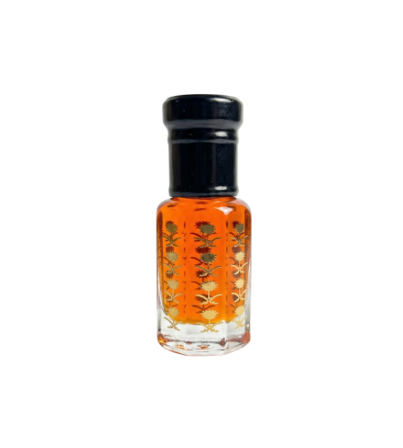 Small glass bottle with a black cap containing an orange liquid on a white background