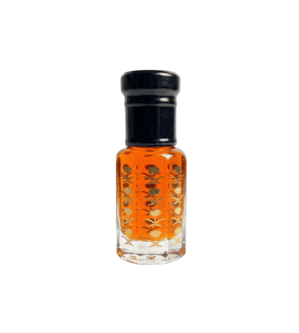 Small glass bottle with a black cap containing an orange liquid on a white background