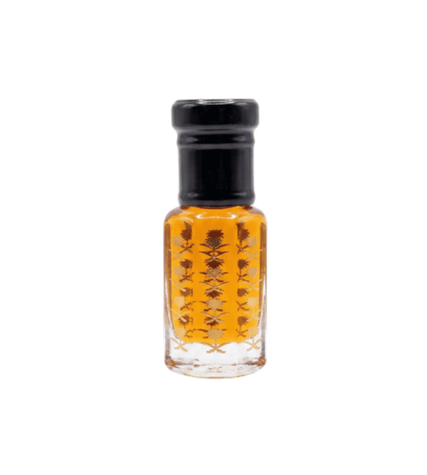 Small glass bottle with black cap containing a yellowish liquid on a white background