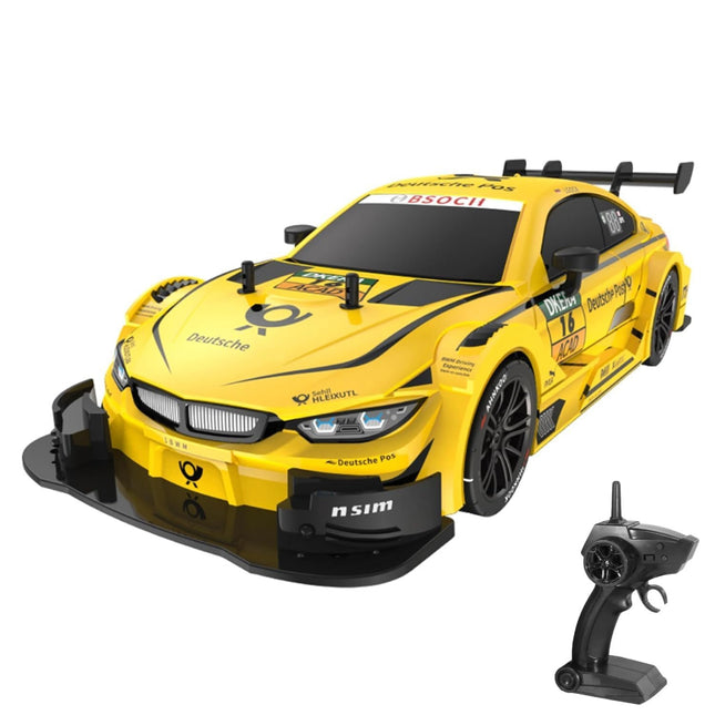 Yellow toy race car with black details and a remote control on a white background