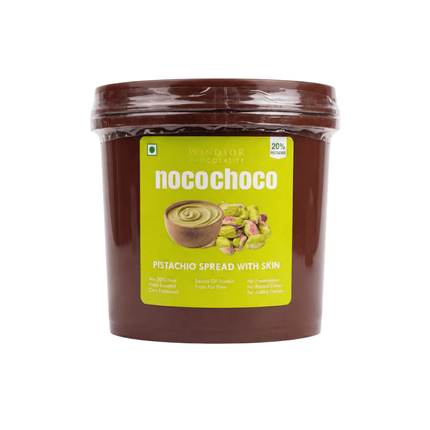 Jar of NocoChoco pistachio spread with skin on a white background