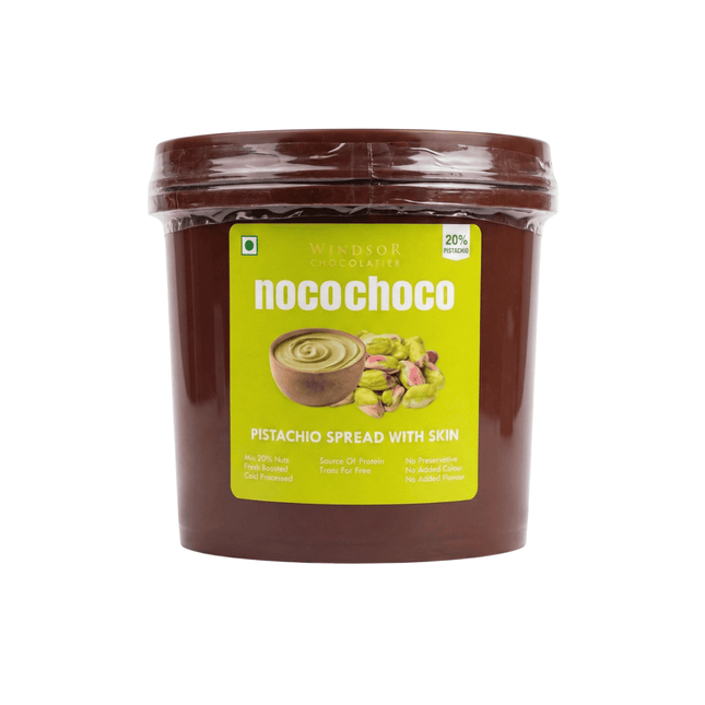 Jar of NocoChoco pistachio spread with skin on a white background