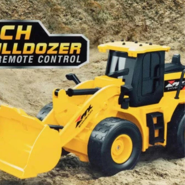 Toy bulldozer with remote control feature on a dirt background