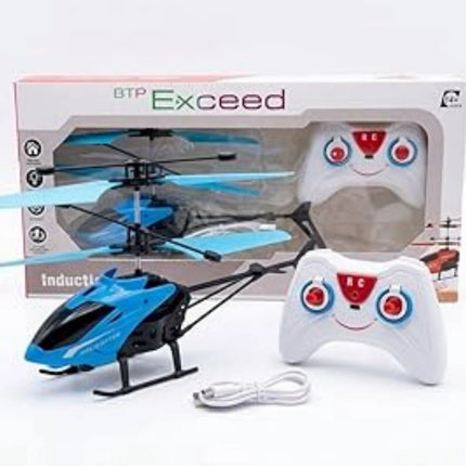 Induction helicopter with remote control and BTP Exceed packaging in the background