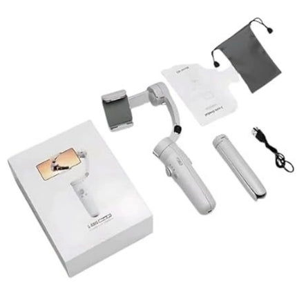 White handheld device with accessories on a white background