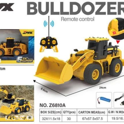 Toy bulldozer with remote control on a gray background