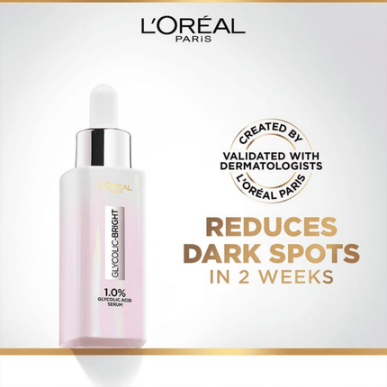 L'Oreal Paris serum bottle with branding and text on a light background