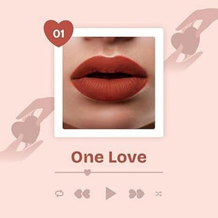Lipstick swatch with 'One Love' text on a pink background