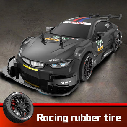 Black racing car with visible branding on a dark background