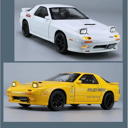 Two cars, one white and one yellow, on a gray background