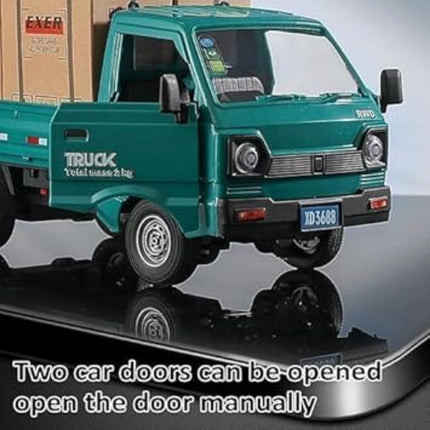 Model green truck with open doors on a reflective surface