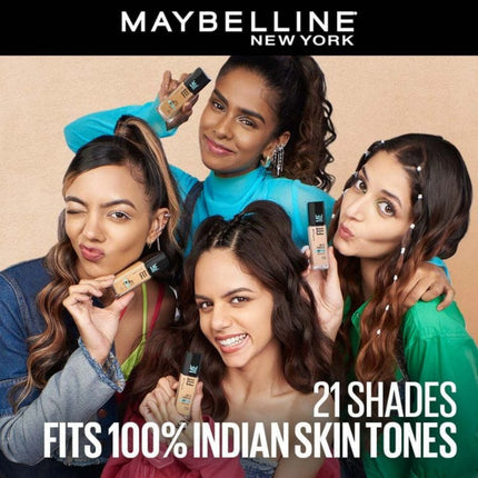 Maybelline New York advertisement with four women holding makeup products against a beige background.