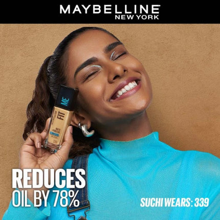 Woman holding a Maybelline foundation bottle with text on a beige background