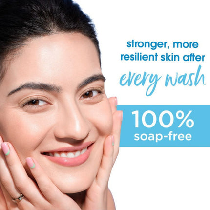 Woman with smooth skin holding her face, with text about soap-free skincare.