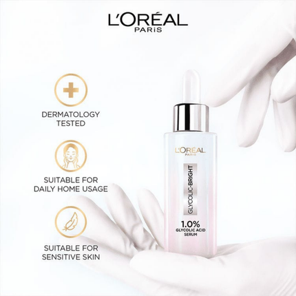 L'Oreal Paris skincare serum bottle with branding and product features on a white background