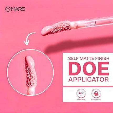 Mars makeup applicator with pink liquid on a pink background