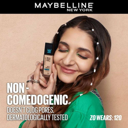 Woman holding a Maybelline foundation bottle with product details on a beige background