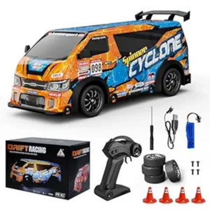 RC car with remote control, accessories, and packaging on a white background
