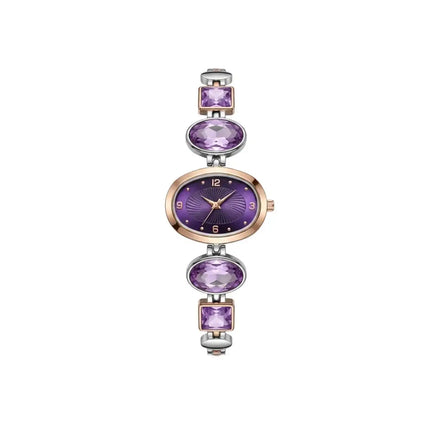 Purple and gold watch with gemstone accents on a white background