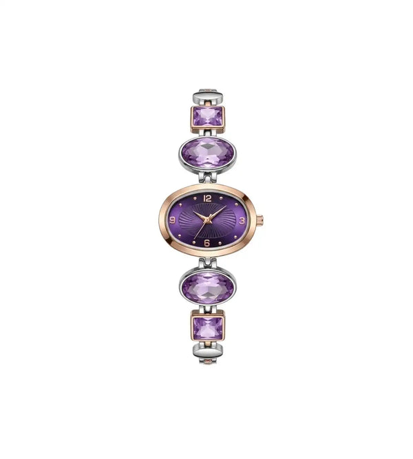 Purple and gold watch with gemstone accents on a white background