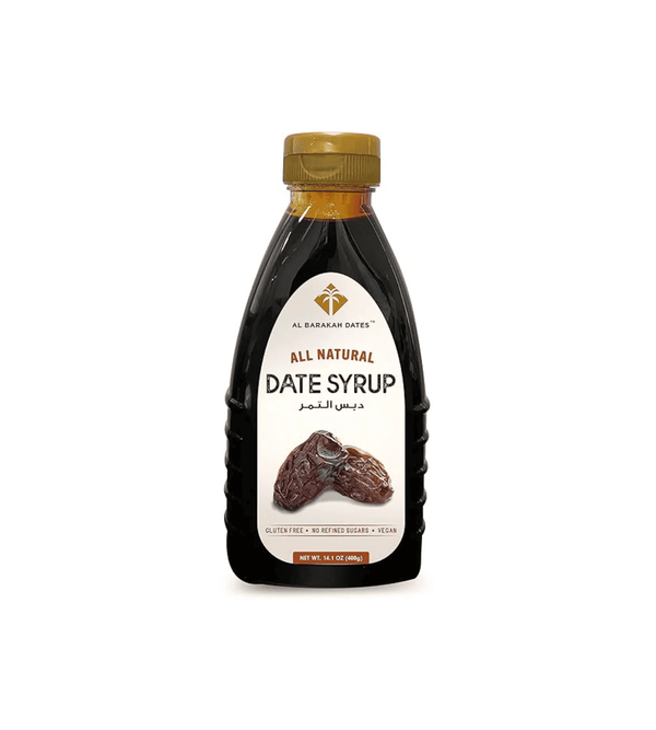 Bottle of Al Fardous All Natural Date Syrup on a white background
