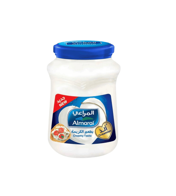Jar of Almarai creamy taste  cheese on a white background