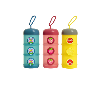 Three colorful cylindrical containers with fruit-themed designs on a white background
