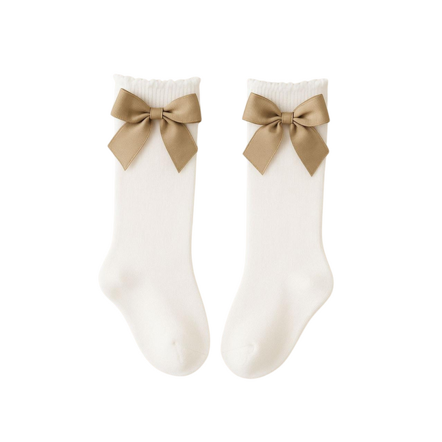 White socks with beige bows on a white background