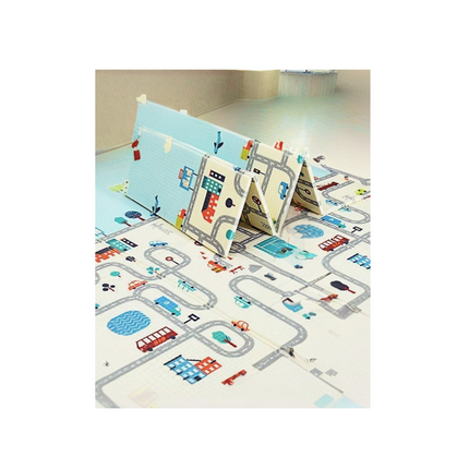 Children's play mat with road design and toy cars on a white background