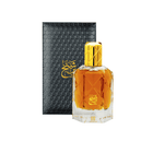 Perfume bottle with gold cap and black hexagonal packaging on a white background