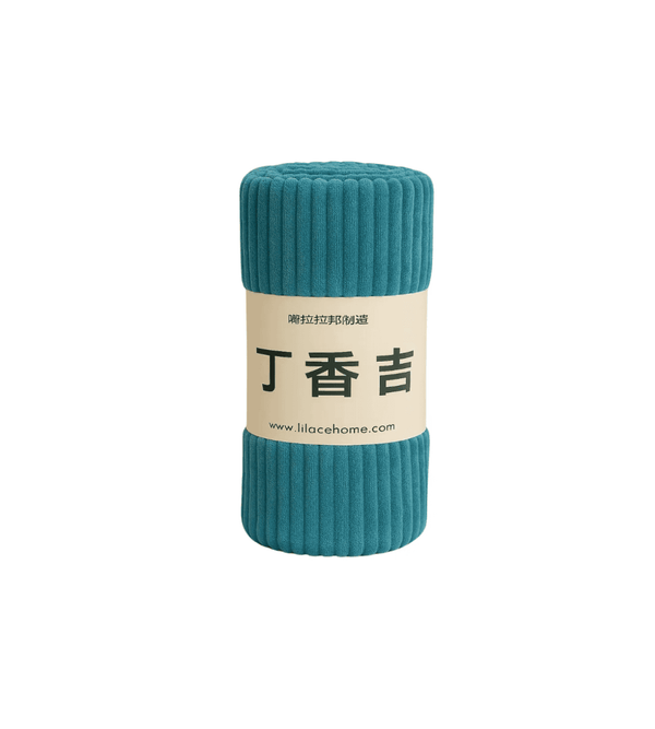 Teal cylindrical soft blanket with a label on a white background