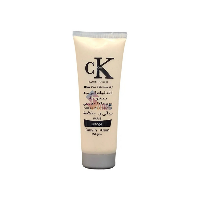 Calvin Klein facial scrub orange tube on a white background