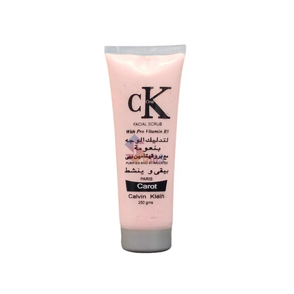 Pink facial scrub tube with Calvin Klein branding on a white background