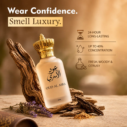 Oud Al Asra perfume bottle with a gold cap, styled on driftwood with lavender and spices against a warm, blurred background. Text on the image reads 'Wear Confidence.