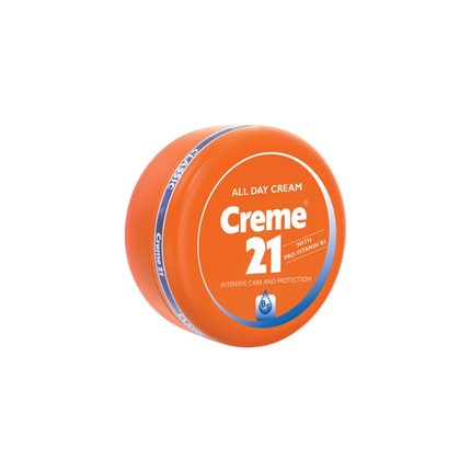 Orange container of Creme 21 cream on a white background