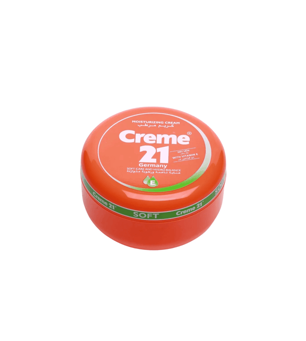 Orange jar of Creme 21 cream on a white background
