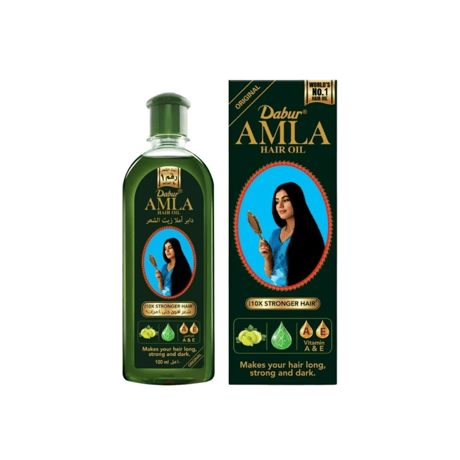 Dabur Amla hair oil bottle and packaging on a white background