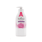 Enchanteur bottle with pink rose design on a white background